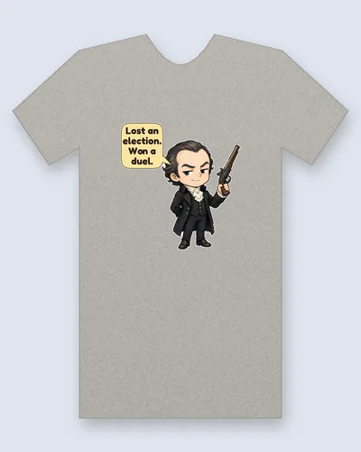 Aaron Burr tee mockup: Aaron Burr with dark swept-back hair and a sly smirk, in a black coat and white cravat, holding up a flintlock pistol, saying “Lost an election. Won a duel.”
