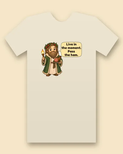 Ghost of Christmas Present tee mockup: A bearded giant with long brown curls and a holly crown, in a green robe trimmed with white fur, holding a glowing torch in one hand and a platter with a glazed ham in the other, with a speech bubble beside him