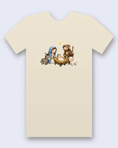 Nativity tee mockup: a Nativity scene with Mary in a blue veil kneeling in prayer, Joseph holding a shepherd's staff, the infant Jesus asleep in a straw-filled manger, a donkey, a lamb and a bright star above