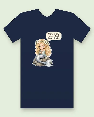 Andersen Sea Maiden tee mockup: a sea maiden with long blonde waves and a wreath of white lilies, arms crossed and frowning, sitting on a mossy rock beside pearl oysters, saying “Gave up my voice. Kept the attitude.”