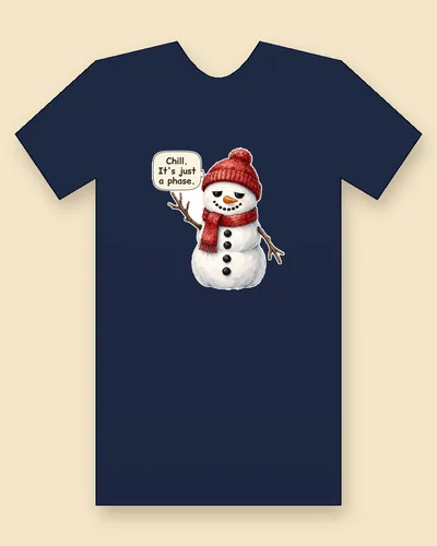 Snowman tee mockup: a sleepy-eyed snowman in a red knit beanie and red scarf, with coal buttons, a carrot nose and stick arms, saying “Chill. It's just a phase.”