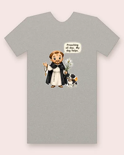 Saint Dominic de Guzman tee mockup: a preacher in a white habit and black cloak with a little star on his forehead, holding a rosary and a white lily, beside a black and white puppy carrying a lit torch, saying “Preaching all day. My dog helps.”