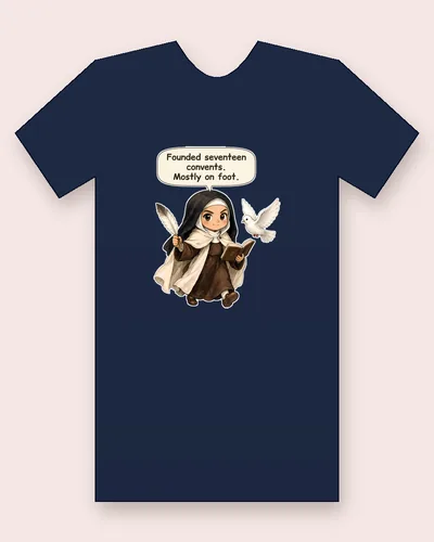 Saint Teresa of Avila tee mockup: a nun in a brown habit, cream mantle and black veil, holding a feather quill and an open book, with a white dove flying beside her, saying “Founded seventeen convents. Mostly on foot.”