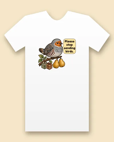 Twelve Days of Christmas tee mockup: A round grey bird with an orange face on a leafy branch with two golden pears and two ribboned gift boxes, saying “Please stop sending birds.”