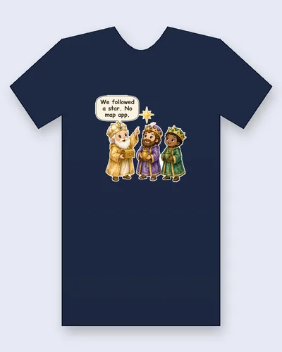 Three Wise Men tee mockup: the Three Wise Men in gold, purple and green robes with jeweled crowns, carrying gifts of gold, frankincense and myrrh, the eldest king pointing up at a bright star, saying “We followed a star. No map app.”